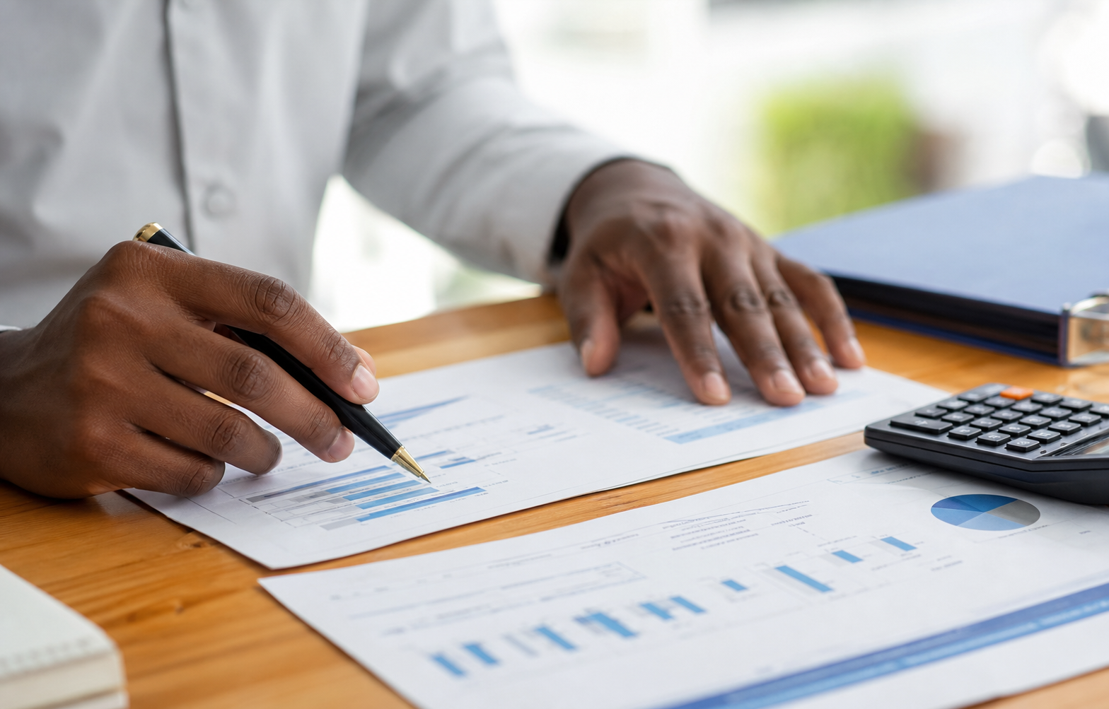 Hands checking business documents